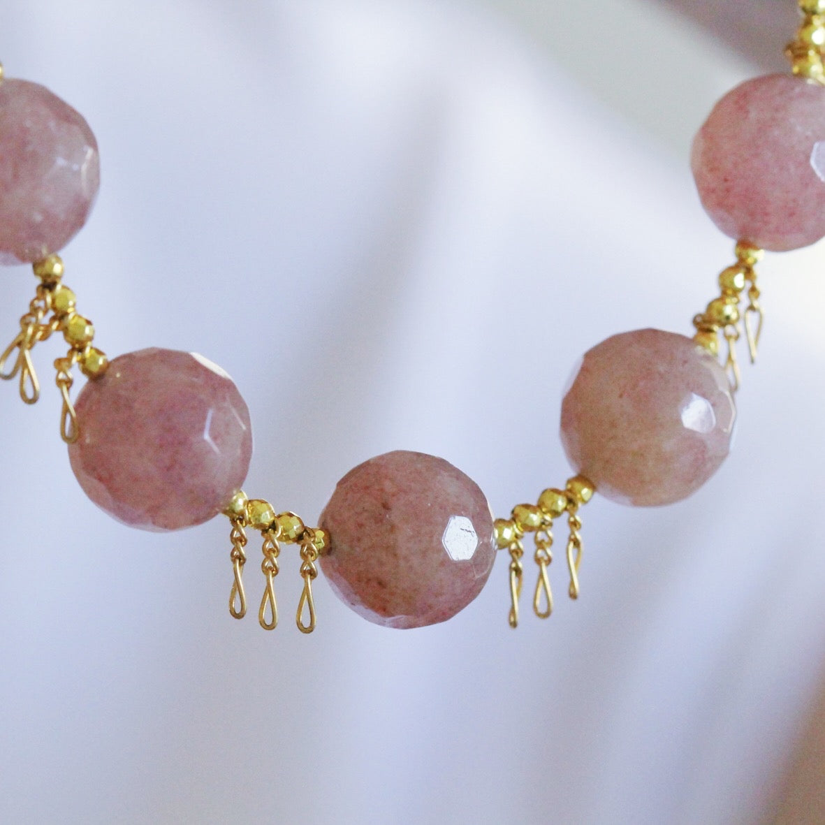 Bracciale frange fragola