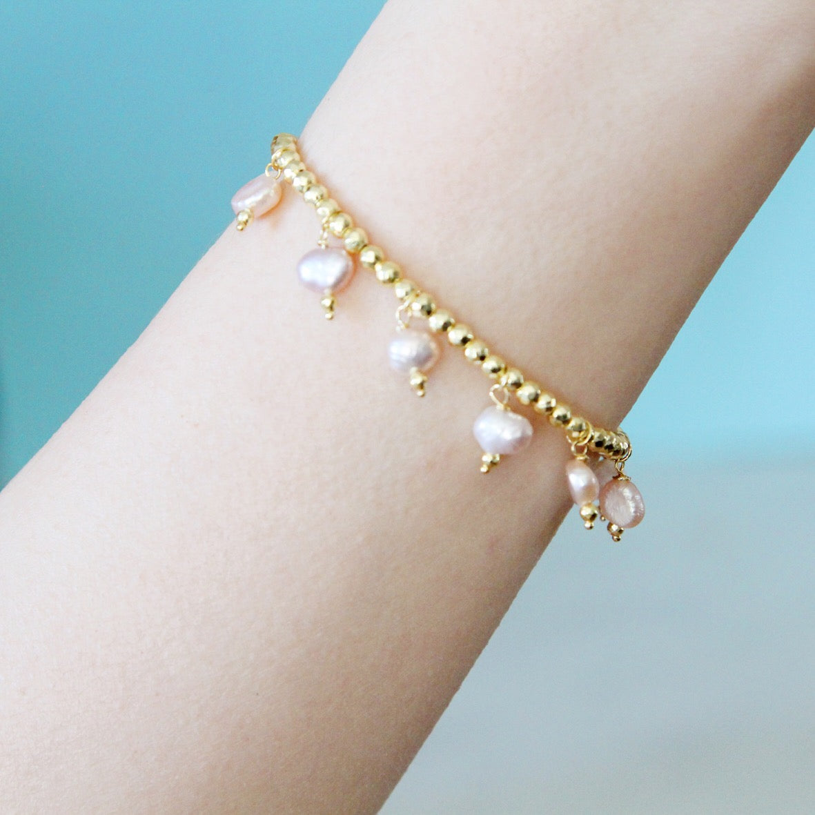 Bracciale Charms di perle rosa