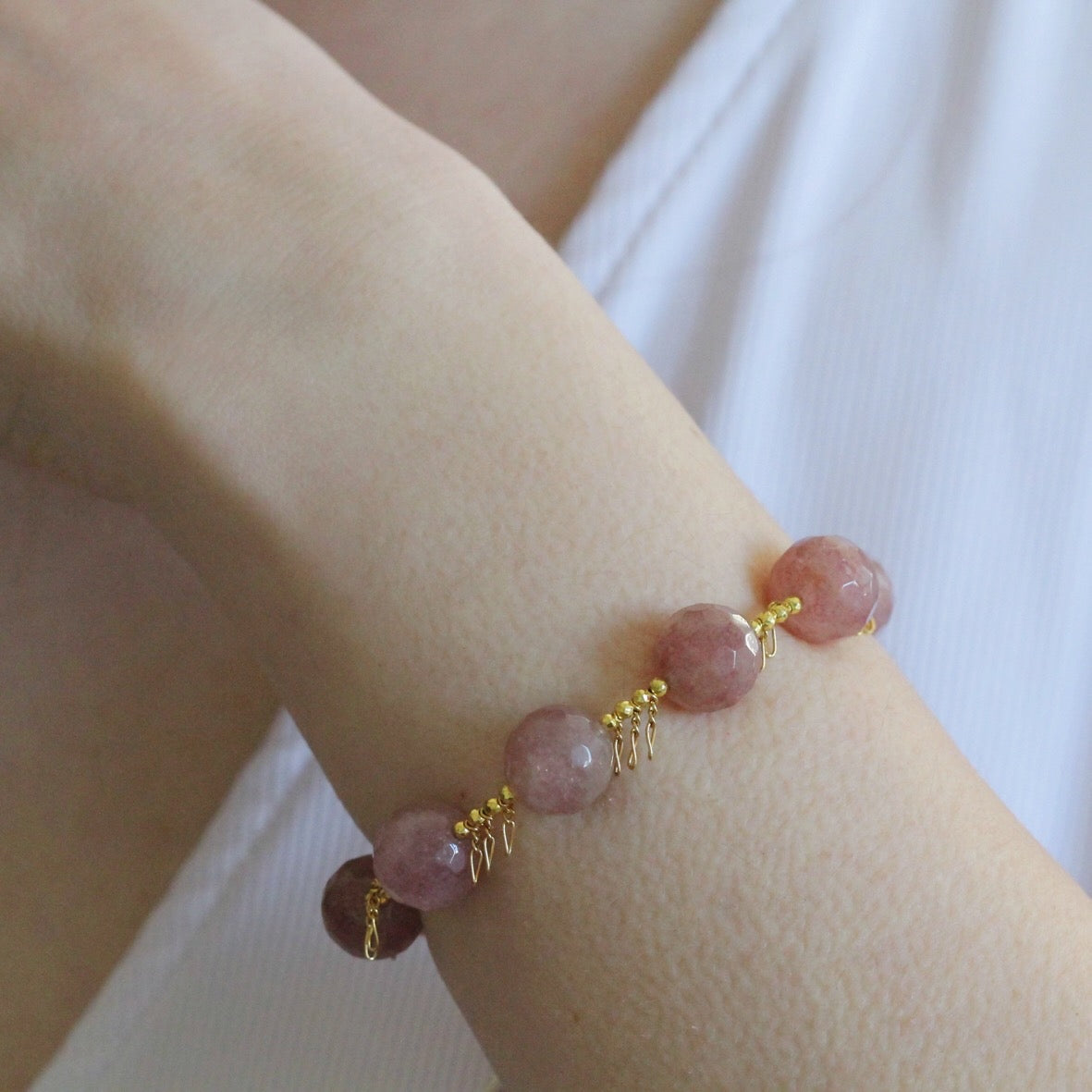 Bracciale frange fragola