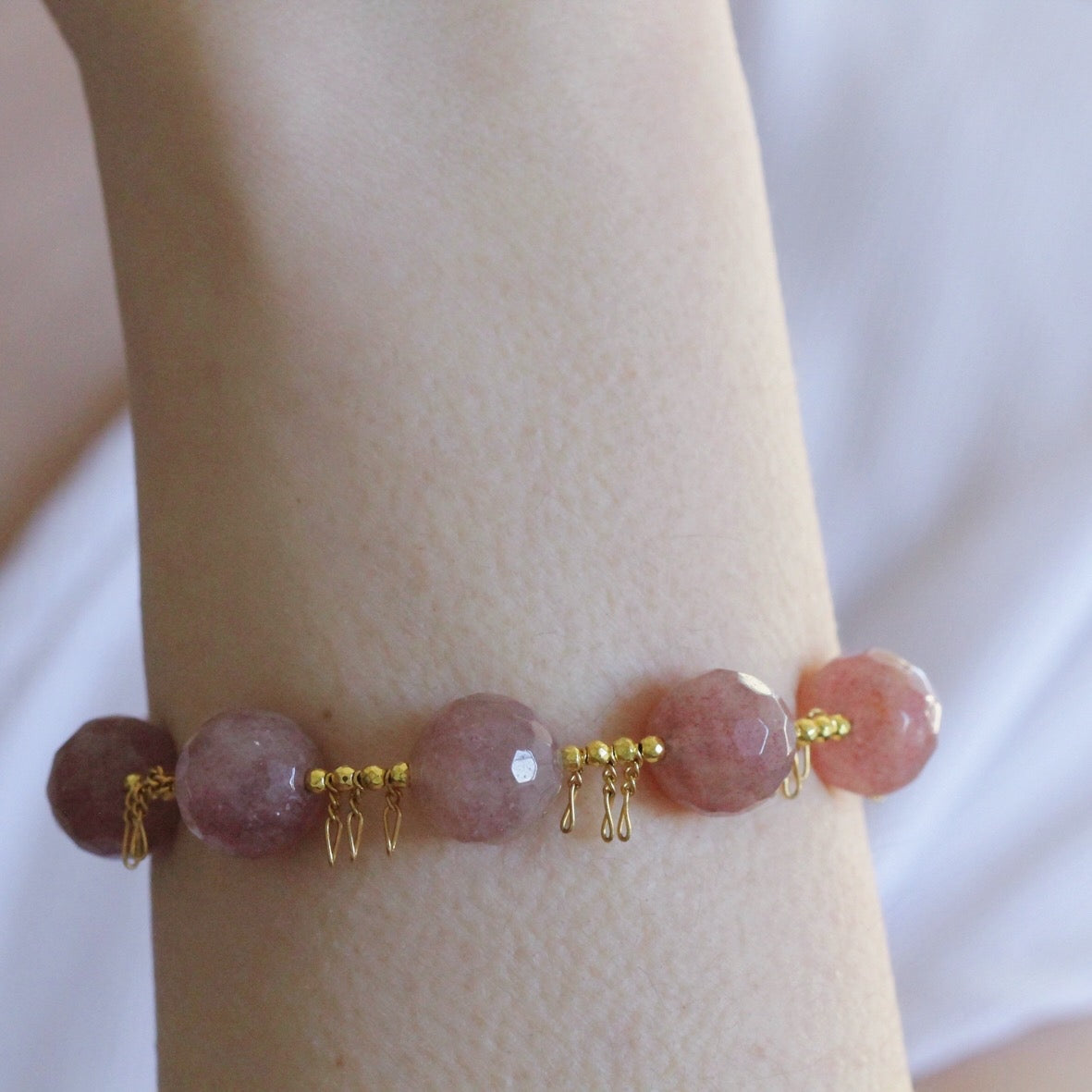 Bracciale frange fragola