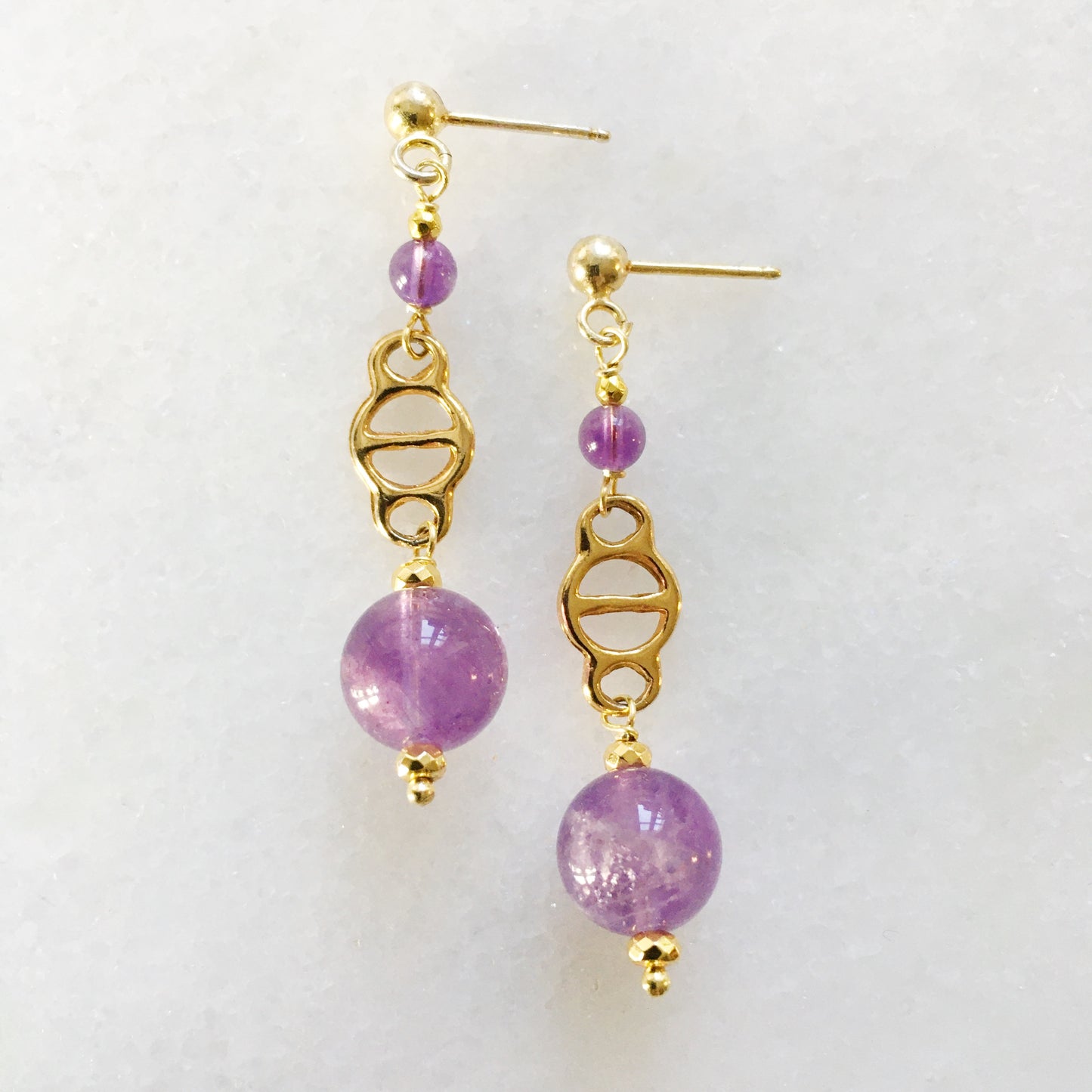 Orecchini Decò viola corti